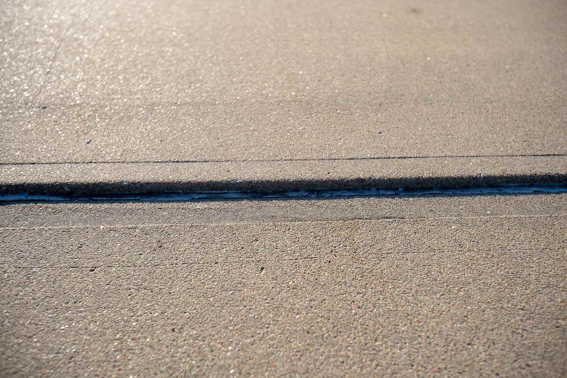 uneven driveway concrete